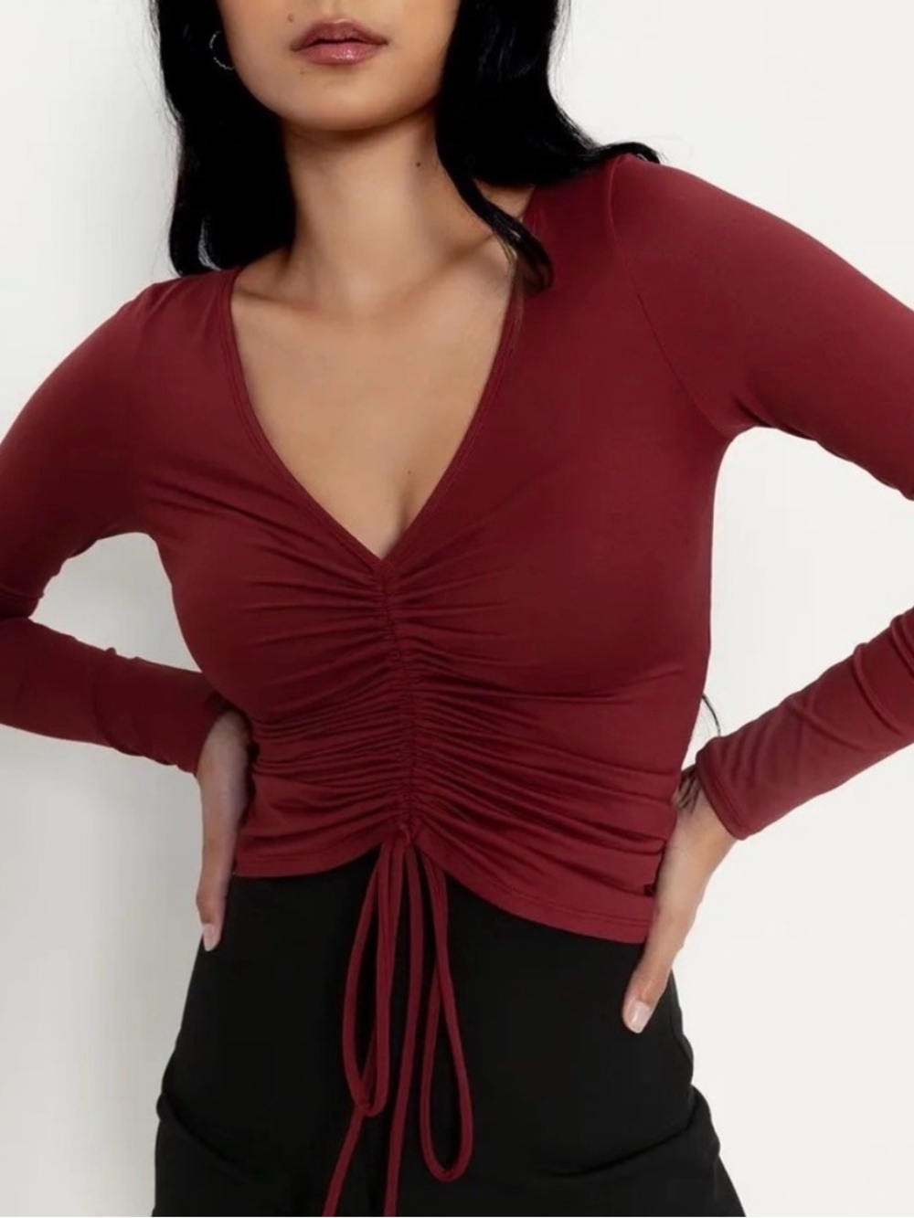 Blackmilk 'Matte Festive Red
Strung Up Long Sleeve Top'
Size XL